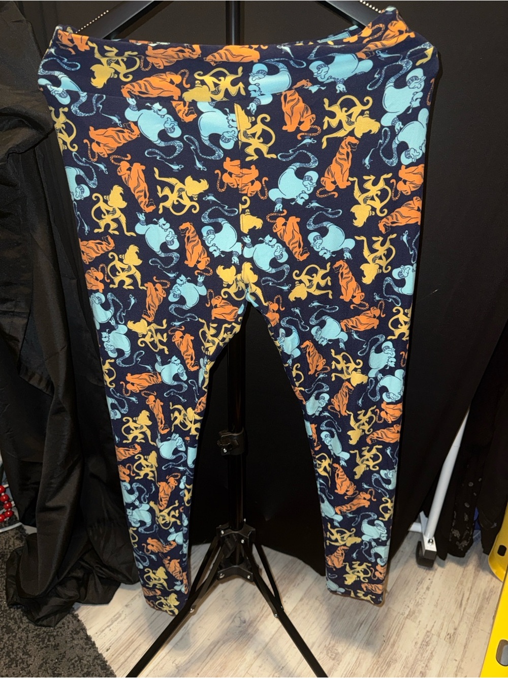 LuLaRoe Navy Leggings with Orange, Yellow & Light Blue Animal Print